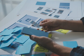 ux Graphic designer creative sketch planning application process development prototype wireframe for web mobile phone . User experience concept.