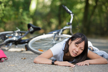 young woman fell off her bike