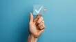 © 2D_Jungle - Photograph a hand gesturing towards a product, with the check mark symbol prominently displayed, showcasing the product's adherence to stringent quality standards.