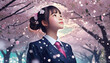 桜吹雪の中の女子生徒　入学・卒業イメージ
