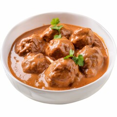 Wall Mural - A white bowl is filled with flavorful meatballs and savory sauce, creating a mouthwatering sight
