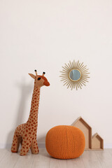 Wall Mural - Beautiful children's room with light wall and toys. Interior design