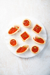 Canvas Print - Red caviar served in tartlets