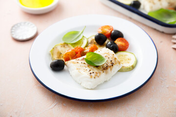 Canvas Print - Roasted cod with olives, tomato and zucchini