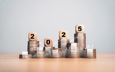 2025 Year on the top of coins stacking for financial plan in new year include budget tax investment saving concept.