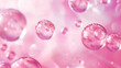 Floating translucent bubbles with reflections in a shimmering pink background.
