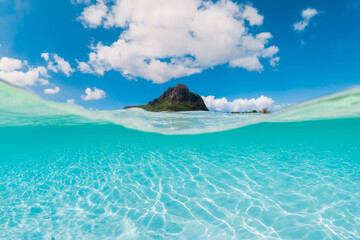 Wall Mural - Turquoise sea and Le Morne mountain in Mauritius. Split view