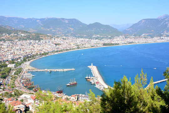 mediterranean sea with lighthouse and Alanya city in the background 