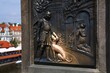 Dog statue in Charles Bridge, Prague. Landmarks of Czech Republic.