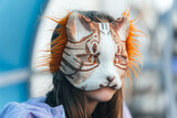 Fototapeta Przestrzenne - quadrobics. girl in a cat mask is lying