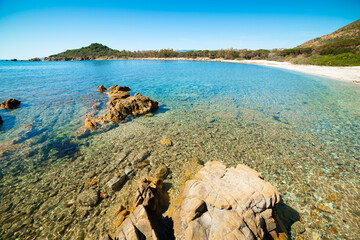 Poster - Blue sea and rocks in Porto Pirastu beach