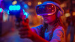 © VISUAL BACKGROUND - A young girl wearing a virtual reality headset.
