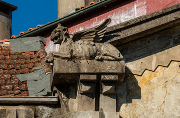 Wall Mural - granite dragon sculpture at a house in Braga, Portugal