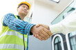 Construction team hands shaking greeting start up plan new project contract in office center at construction site, industry ,architecture, partner, teamwork, agreement, property, contacts.