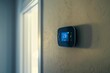Medium photo of a smart thermostat on a wall displaying cooling mode, with a window in the background