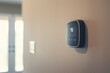 A medium photo of a smart thermostat mounted on a wall, displaying a cooling mode setting