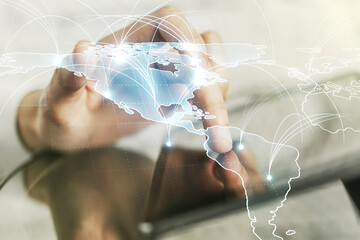 Poster - Double exposure of abstract digital world map with connections and hand working with a digital tablet on background, big data and blockchain concept
