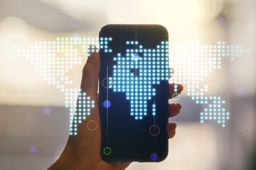 Poster - Double exposure of abstract digital world map and hand with cell phone on background, research and strategy concept