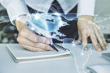Poster - Double exposure of abstract digital world map with connections and hand writing in notepad on background with laptop, big data and blockchain concept