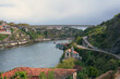 © Cristian Blázquez - Scenic view of Porto historic waterfront and Douro river during daytime