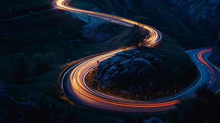 Aufkleber - Car headlights and tail lights on a winding mountain road, nighttime driving