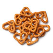 Heap of heart shaped pretzels isolated on white background close up