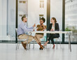 © peopleimages.com - Business people, office and meeting with planning and news content conversation with staff meeting. Collaboration, teamwork and publishing company with discussion for publisher project and article