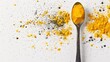 © JP STUDIO LAB - High-resolution image of turmeric powder scattered over a spoon, isolated on a pure white background with vivid color contrast