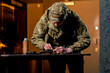 in a professional shooting range professional fighter parts cleans pistol introductory briefing