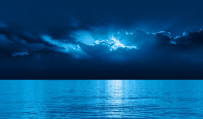 Aufkleber - Night sky with moon in the dark clouds and darkblue sea in the foreground 