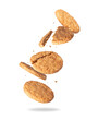 Levitation of oat cookies in the air isolated on a white background