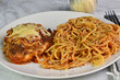 chicken parmesan  served with spaghetti and sauce