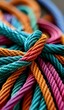 Colorful rope tied in knots representing strength and diversity.