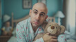 Bald adult man in pyjamas holding a teddy bear, suggesting he is immature and lives with his parents
