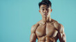 © goami - muscular bodybuilder athlete man with perfect body and naked torso posing on blue background, bodybuilding athletic chinese asian male studio shot