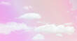 Purple pink orange yellow pastel sky with white cloud. Cumulus clouds. Wedding, Love, Valentine, Romance background. Summer tropical holiday sky. Beautiful nature.