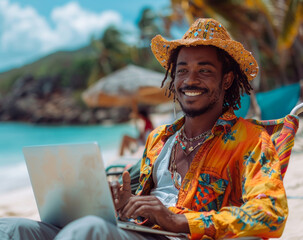 Wall Mural - Man works on his laptop on the beach