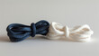 Two knotted ropes on a white background.