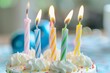 Closeup of birthday candles on a cake with a blurred background A birthday concept photo with space for text Generative AI