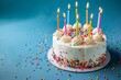 Close up of a birthday cake with colorful candles on a blue background, in the style of a copy space concept for a happy holiday celebration Generative AI