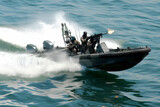 Fototapeta  - Navy Special Force ride fast interceptor boat.