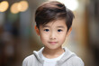 Portrait of an Asian boy, close-up