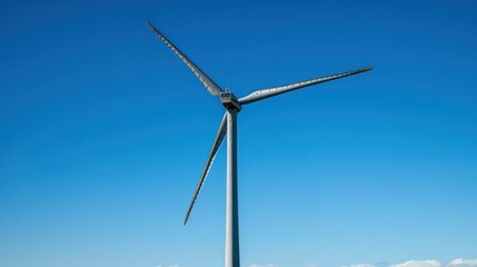 A single majestic wind turbine towers under a vast blue sky, symbolizing renewable energy and environmental conservation