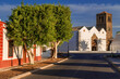 Street view and The Basilica of the Royal Marian Shrine of Our Lady of Candelaria illuminated in summer season in Fuerteventura Island