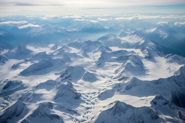 Wall Mural - Aerial view of snowy mountain landscape