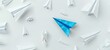 Blue paper airplane leading the way, surrounded by many white paperships with one flying out of shape on a pure white background.