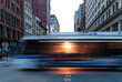© deberarr - Sunlight shining through a city bus as it's driving down the street on 5th Avenue in New York City with motion blur effect