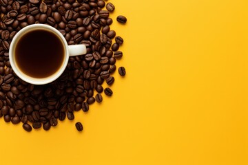 Wall Mural - Cup of freshly brewed roasted coffee beans on yellow background