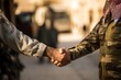concept of war truce, military agreement represented with two different or opposite side soldiers shaking hands