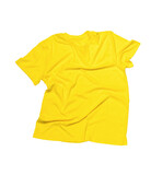 Fototapeta Most - A crumpled yellow T-shirt isolated on a white background.